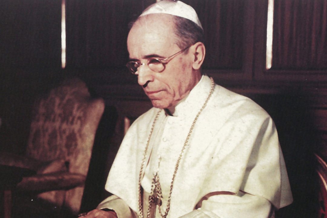Pope Pius XII writes one of his wartime Christmas radio messages using a typewriter at the Vatican in this undated photo. On Nov. 4 the Vatican opened a major exhibit on the life and pontificate of Pope Pius XII, highlighting the late pope's actions on behalf of Jews and others who suffered during World War II.
(CNS photo/courtesy of Libreria Editrice Vaticana) (Nov. 7, 2008) See PIUS-EXHIBIT Nov. 4, 2008.
